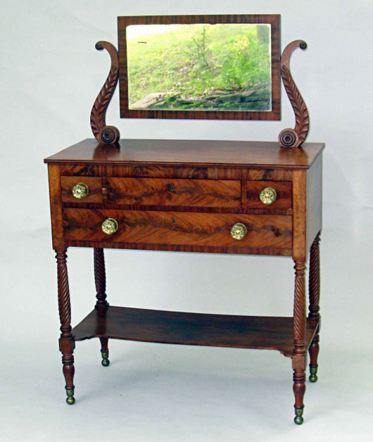 Well-crafted early 19th-century American mahogany dresser with lyre-carved supported mirror, $1,840.